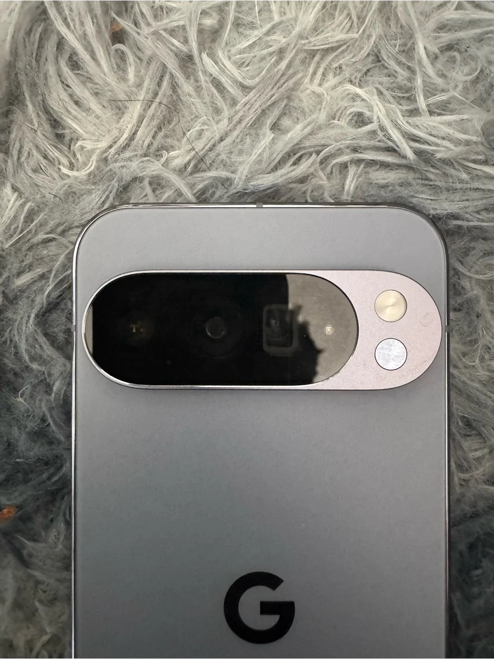Matte Gray Cell Phone with Subtle Circular Logo - Sleek Modern Finish